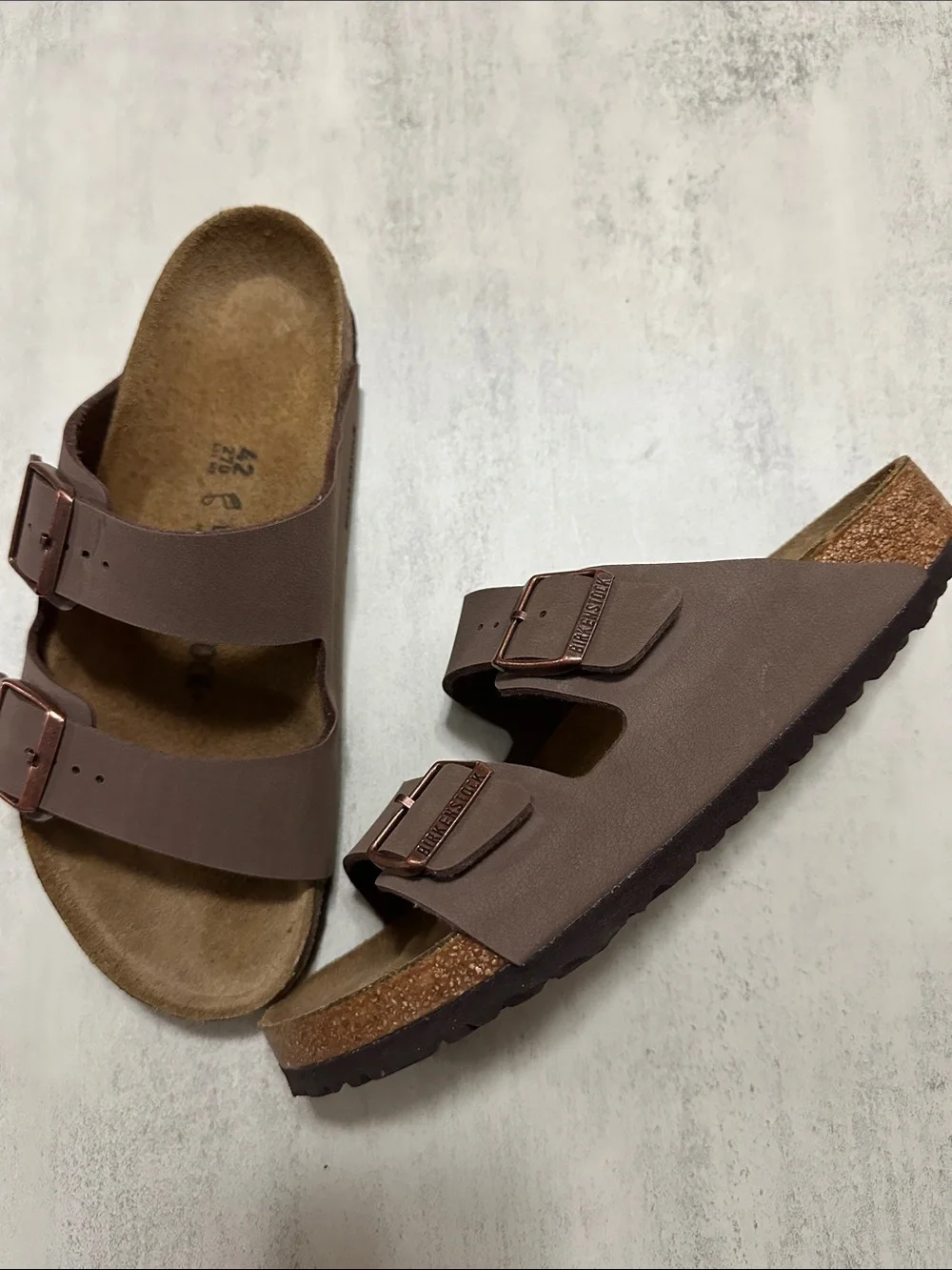 Birkenstock Men's Slide Sandals in Dark Brown (Mocha) with Copper Buckles